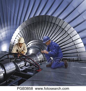 Stock Photo - hong kong,  china 
 engineer sets 
up turbine rotor 
during construction. 
fotosearch - search 
stock photos, 
pictures, images, 
and photo clipart
