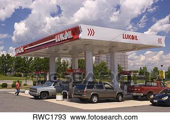 Stock Photo - mclean,  virginia, 
 usa - customers 
purchase gas at 
russian-owned. 
fotosearch - search 
stock photos, 
pictures, images, 
and photo clipart