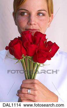 Stock Photo - woman with red 
roses. fotosearch 
- search stock 
photos, pictures, 
images, and photo 
clipart