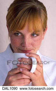 Stock Photography - woman sipping 
from a white mug. 
fotosearch - search 
stock photos, 
pictures, images, 
and photo clipart