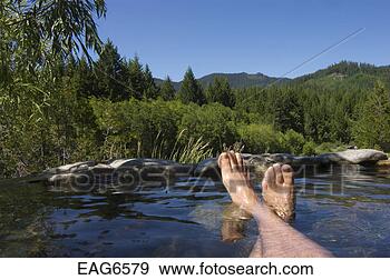 Stock Photograph - relaxing in a 
hot pool at the 
breitenbush hot 
springs in the 
cascade. fotosearch 
- search stock 
photos, pictures, 
images, and photo 
clipart