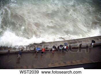 Stock Photograph - people sitting 
on a dam  in rain. 
fotosearch - search 
stock photos, 
pictures, images, 
and photo clipart