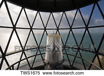 Stock Image - historic lighthouse 
fresnel lens and 
tower overlook 
atlantic ocean. 
fotosearch - search 
stock photos, 
pictures, images, 
and photo clipart