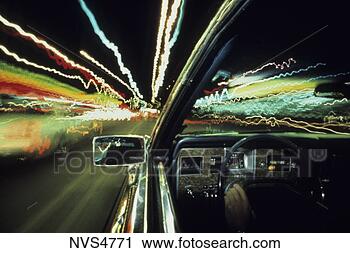 Stock Photography - blurry image of 
traffic at night 
as seen through 
the driver’s side 
of. fotosearch 
- search stock 
photos, pictures, 
images, and photo 
clipart