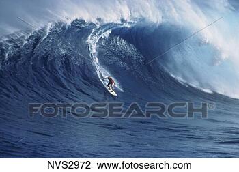 Stock Photo - man surfing a 
large wave off 
the island of 
maui, hawaii. 
fotosearch - search 
stock photos, 
pictures, images, 
and photo clipart