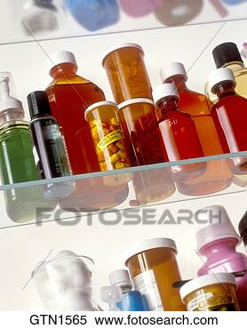 Stock Image - close up of medicine 
bottles inside 
a medicine cabinet. 
fotosearch - search 
stock photos, 
pictures, images, 
and photo clipart