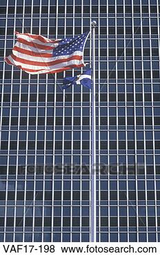 Stock Photo - american flag 
flying in front 
of office building, 
 indianapolis. 
fotosearch - search 
stock photos, 
pictures, images, 
and photo clipart