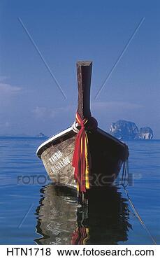 Stock Photo - thailand, krabi 
province, railay 
bay, local boat. 
fotosearch - search 
stock photos, 
pictures, images, 
and photo clipart