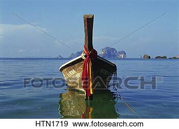 Stock Photograph - thailand, krabi 
province, railay 
bay, local boat. 
fotosearch - search 
stock photos, 
pictures, images, 
and photo clipart
