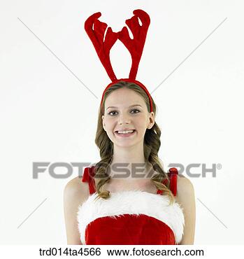 Stock Photo - christmas decoration 
and a woman wearing 
 santa claus' 
clothes. fotosearch 
- search stock 
photos, pictures, 
images, and photo 
clipart