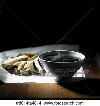 Stock Photo - a bowl of chinese 
medicine and chinese 
medicine. fotosearch 
- search stock 
photos, pictures, 
images, and photo 
clipart