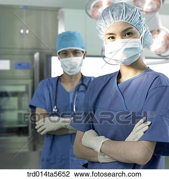 Stock Photo - medicine/ a doctor 
in an operating 
room. fotosearch 
- search stock 
photos, pictures, 
images, and photo 
clipart