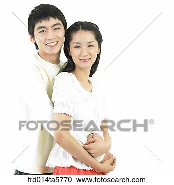 Arquivo de Fotografias - abraçando,  par. 
fotosearch - busca 
de fotos, imagens 
e clipart