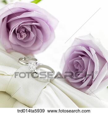 http://comps.fotosearch.com/comp/TGR/TGR337/wedding-ring-flowers_~trd014ta5939.jpg