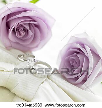 http://comps.fotosearch.com/comp/TGR/TGR337/wedding-ring-flowers_~trd014ta5939.jpg