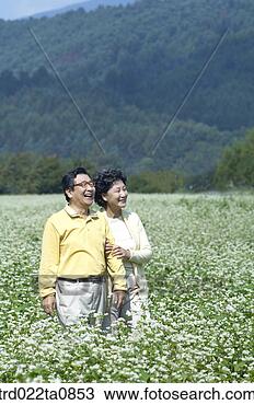 Stock Photo - family, flower 
garden, day, daytime, 
old couple, old. 
fotosearch - search 
stock photos, 
pictures, images, 
and photo clipart