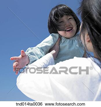 Stock Photo - a smiling child 
and a woman. fotosearch 
- search stock 
photos, pictures, 
images, and photo 
clipart
