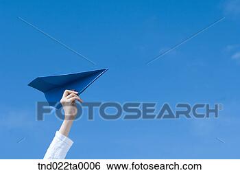 Stock Photo - a woman playing 
with a paper airplane. 
fotosearch - search 
stock photos, 
pictures, images, 
and photo clipart