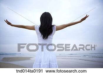 Stock Photography - back figure of 
the couple with 
stretching arms. 
fotosearch - search 
stock photos, 
pictures, images, 
and photo clipart