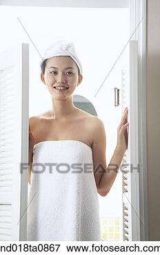 Picture - woman coming inside 
the door. fotosearch 
- search stock 
photos, pictures, 
images, and photo 
clipart