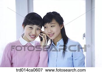 Foto - escola,  uniforme, 
 sala aula,  educação, 
 dia,  asiático, 
 sorrizo. fotosearch 
- busca de fotos, 
imagens e clipart