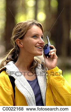 Stock Photo - communication, 
 hiking,  forest, 
 smiling,  talking, 
 two-way radio. 
fotosearch - search 
stock photos, 
pictures, images, 
and photo clipart