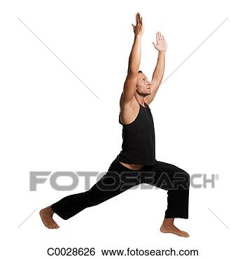 Stock Photo - a man practices 
yoga, lunging 
forward in a warrior 
pose. fotosearch 
- search stock 
photos, pictures, 
images, and photo 
clipart