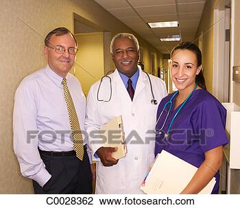 Stock Photo - medical group 
portrait of a 
doctor,  nurse 
and administrator 
in the. fotosearch 
- search stock 
photos, pictures, 
images, and photo 
clipart