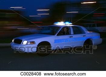 Stock Photo - a police car speeds 
past the viewer, 
motion blurred. 
fotosearch - search 
stock photos, 
pictures, images, 
and photo clipart