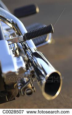 Picture - still-life close-up 
of a chrome tailpipe 
of a motorcycle. 
fotosearch - search 
stock photos, 
pictures, images, 
and photo clipart