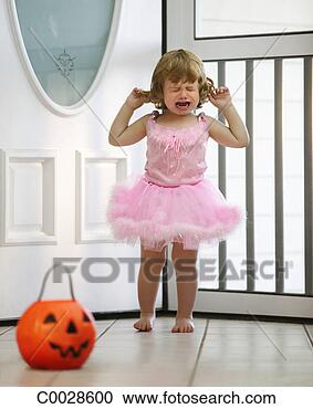 Stock Photography - a toddler dressed 
in a ballet outfit 
for halloween 
chooses candy 
from. fotosearch 
- search stock 
photos, pictures, 
images, and photo 
clipart
