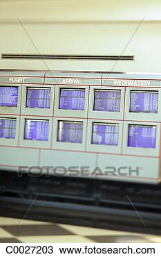Stock Photo - a wall of monitors 
for arrivals and 
departures at 
an airport. fotosearch 
- search stock 
photos, pictures, 
images, and photo 
clipart