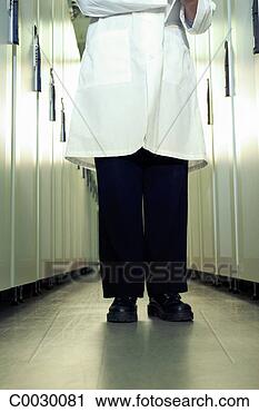 Stock Photography - close-up of a 
computer technician’s 
legs standing 
in an aisle of. 
fotosearch - search 
stock photos, 
pictures, images, 
and photo clipart