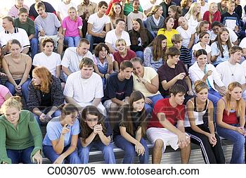 Stock Image - a crowd watches 
a game intently 
while pointing 
to the field from 
the. fotosearch 
- search stock 
photos, pictures, 
images, and photo 
clipart