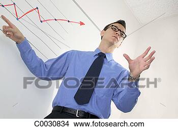Stock Photo - low angle of a 
businessman giving 
a presentation 
and pointing to 
a. fotosearch 
- search stock 
photos, pictures, 
images, and photo 
clipart
