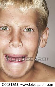 Stock Photo - cropped close-up 
of a shirtless 
boy looking at 
the viewer with 
a. fotosearch 
- search stock 
photos, pictures, 
images, and photo 
clipart