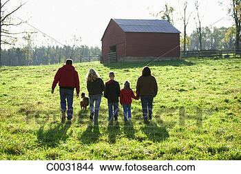 Stock Photo - rear view of a 
silhouetted family 
walking toward 
the barn in a 
field. fotosearch 
- search stock 
photos, pictures, 
wall murals, images, 
and photo clipart