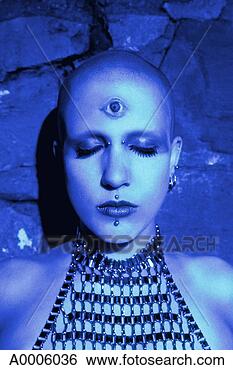 Stock Photo - blue and green 
tone of a woman 
in mesh top with 
third eye up against. 
fotosearch - search 
stock photos, 
pictures, images, 
and photo clipart