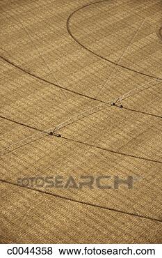 Stock Photo - aerial view of 
curvilinear tracks 
of irrigation 
equipment. fotosearch 
- search stock 
photos, pictures, 
images, and photo 
clipart