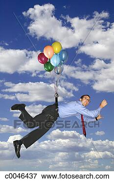 Picture - businessman floating 
away on balloons. 
fotosearch - search 
stock photos, 
pictures, images, 
and photo clipart