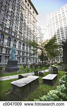 Stock Photograph - cemetery in middle 
of buildings in 
manhattan. fotosearch 
- search stock 
photos, pictures, 
images, and photo 
clipart