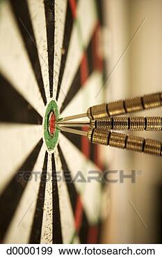 Stock Photograph - darts in bullseye 
of target. fotosearch 
- search stock 
photos, pictures, 
images, and photo 
clipart