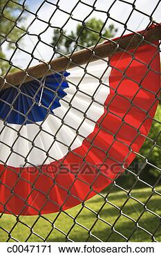 Stock Photography - flag on a fence. 
fotosearch - search 
stock photos, 
pictures, images, 
and photo clipart