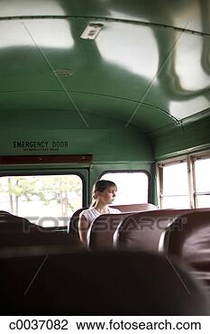 Stock Photo - teenage girl sitting 
in school bus. 
fotosearch - search 
stock photos, 
pictures, images, 
and photo clipart