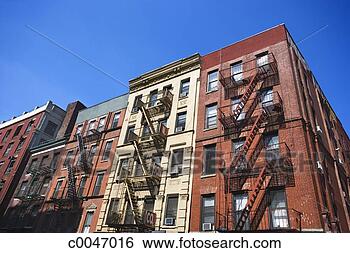Stock Photo - tenement buildings 
in little italy 
area of manhattan. 
fotosearch - search 
stock photos, 
pictures, images, 
and photo clipart