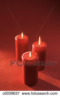 Picture - three red candles. 
fotosearch - search 
stock photos, 
pictures, images, 
and photo clipart
