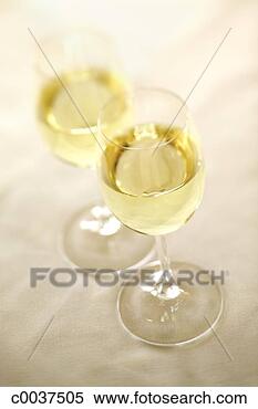 Stock Image - two glasses of 
white wine. fotosearch 
- search stock 
photos, pictures, 
images, and photo 
clipart