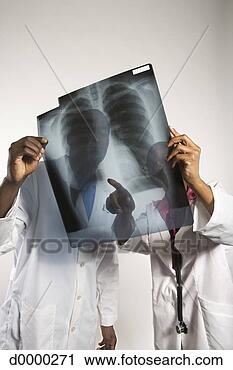 Stock Photography - two healtcare 
professionals 
looking at x-ray. 
fotosearch - search 
stock photos, 
pictures, images, 
and photo clipart
