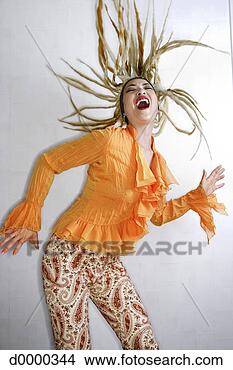 Stock Photo - woman with long 
hair in air while 
dancing. fotosearch 
- search stock 
photos, pictures, 
images, and photo 
clipart