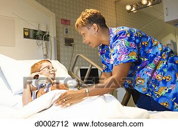 Stock Photo - caring nurse with 
boy. fotosearch 
- search stock 
photos, pictures, 
images, and photo 
clipart